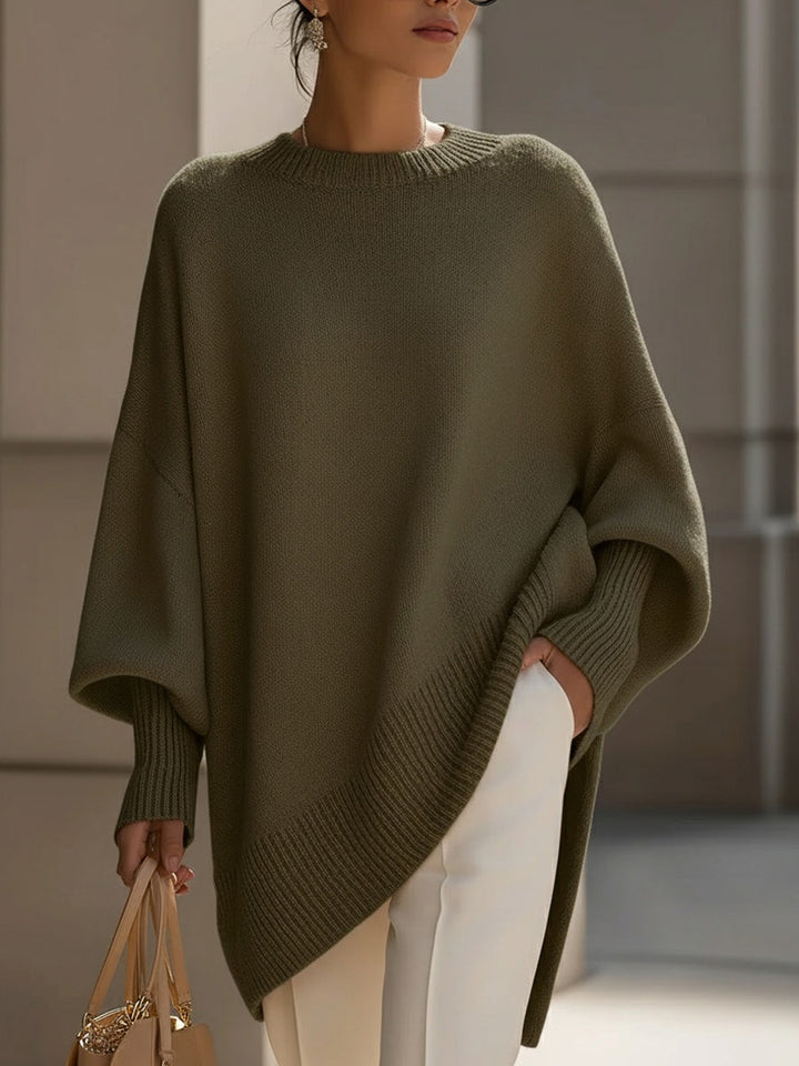 Women's elegant casual long sleeve sweater with a modern asymmetrical hem, offering cozy comfort & relaxed fit.
