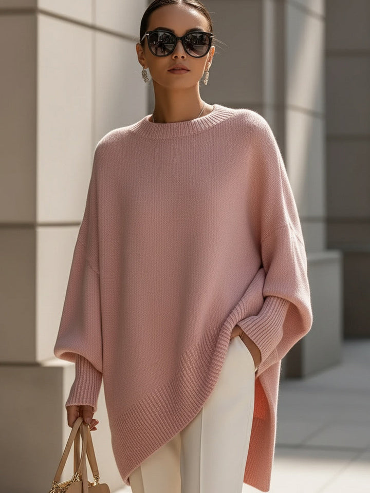 Soft, cozy women's long sleeve sweater with an elegant asymmetrical hem, perfect casual top for modern fashion.