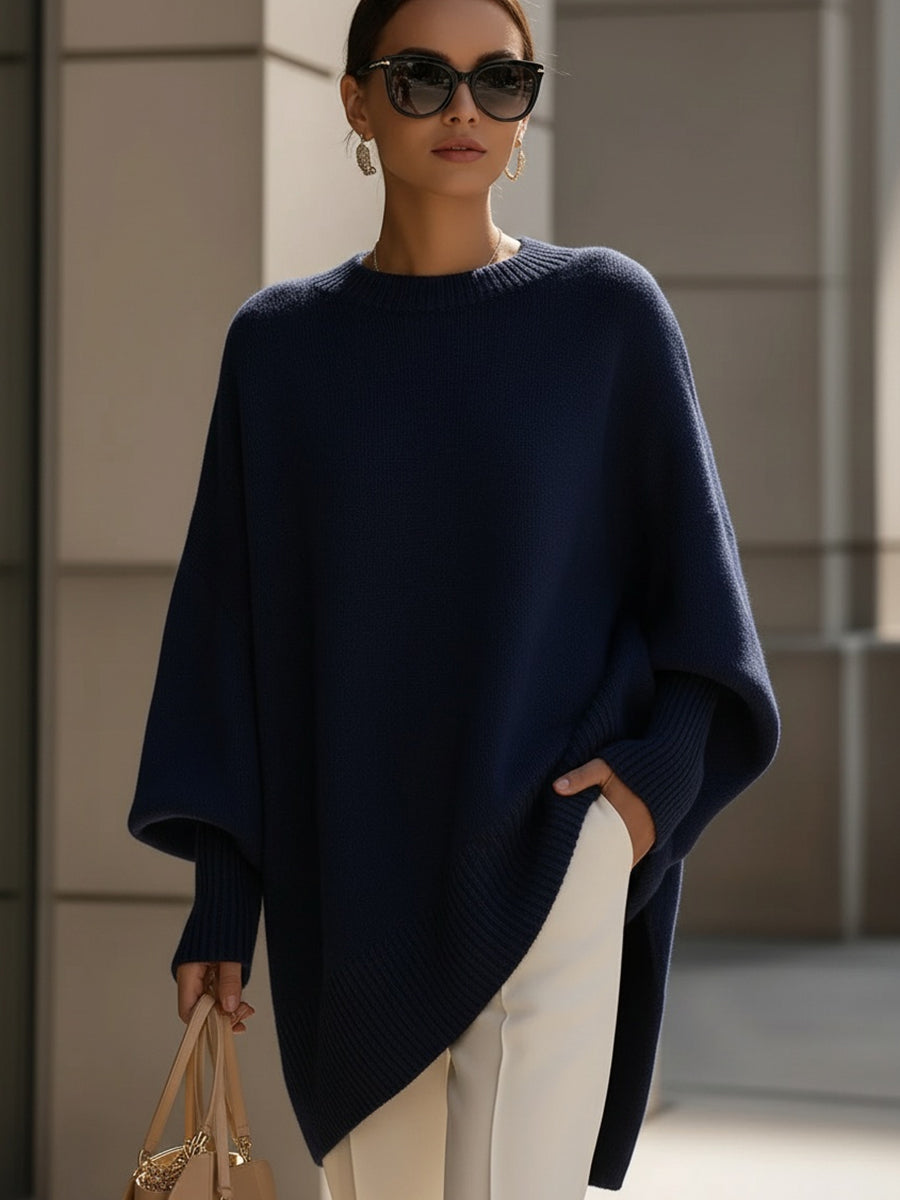 Stylish women's casual sweater showcasing an elegant asymmetrical hem and long sleeves, a modern chic fashion piece.