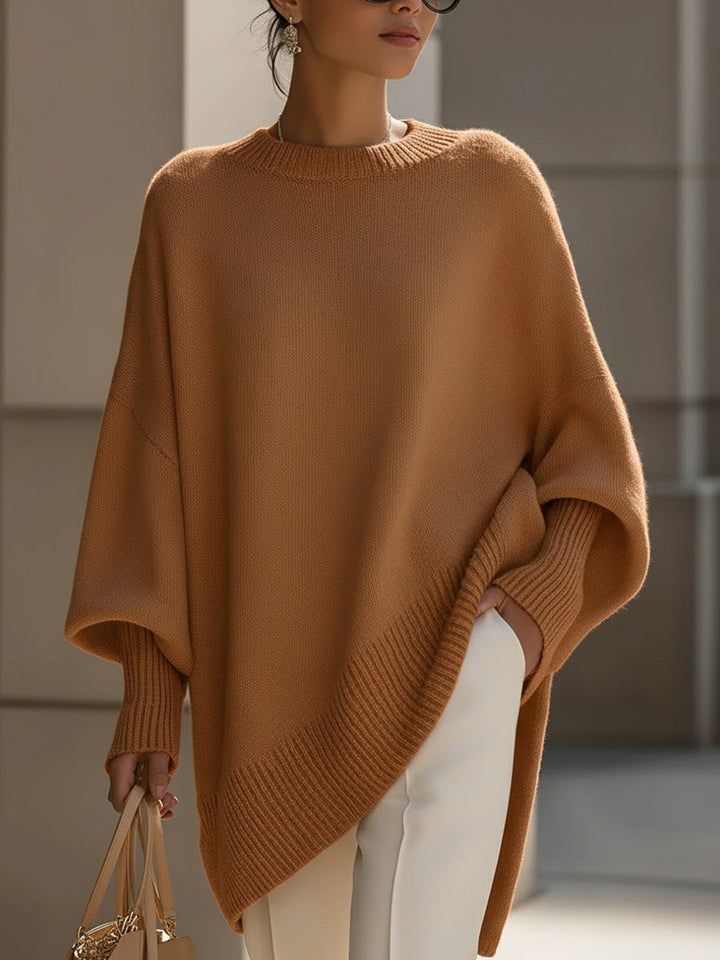 Modern chic women's elegant sweater, casual relaxed fit with a distinctive asymmetrical hem, a cozy fashion top.