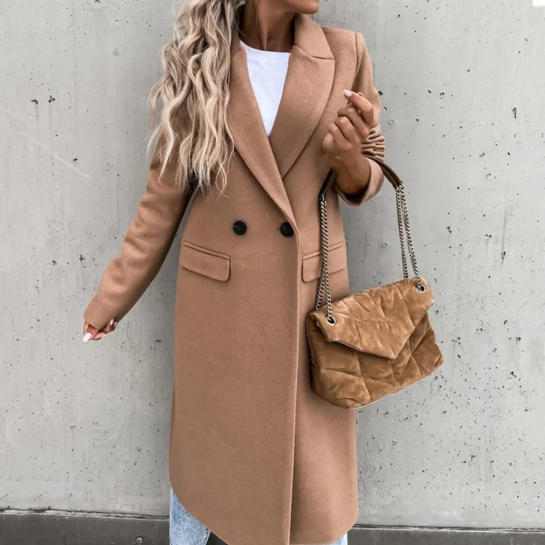 Chic women's double-breasted trench coat for winter, featuring a sophisticated lapel design & long cut.