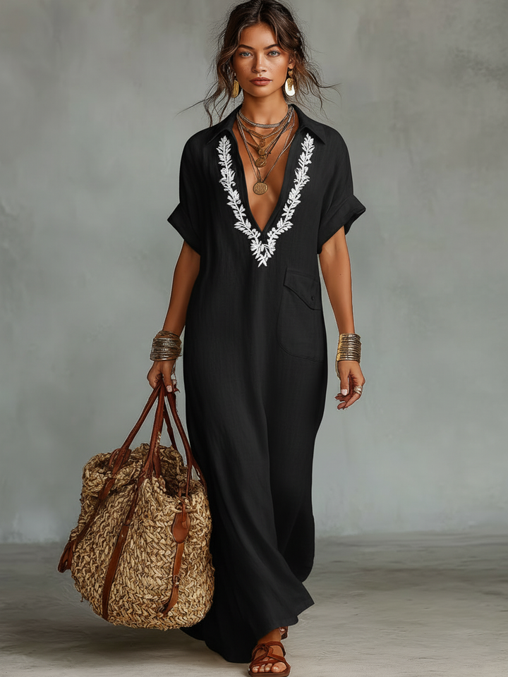 Elegant women's embroidered short sleeve maxi dress, a perfect vacation outfit or comfortable summer day dress.