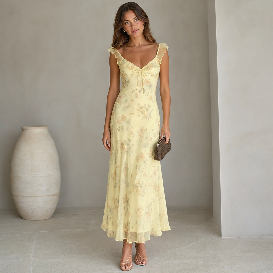Women's elegant floral backless beach dress, perfect for summer vacations & resort wear.