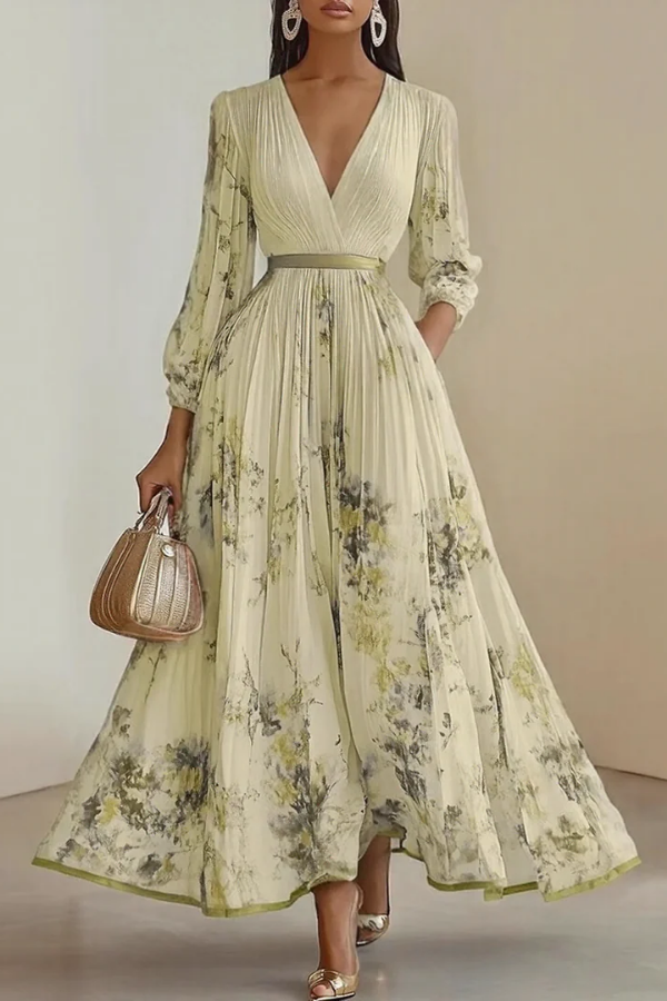 Beautiful women's floral long sleeve maxi dress, featuring a flattering V-neck & delicate pleats for an elegant look.