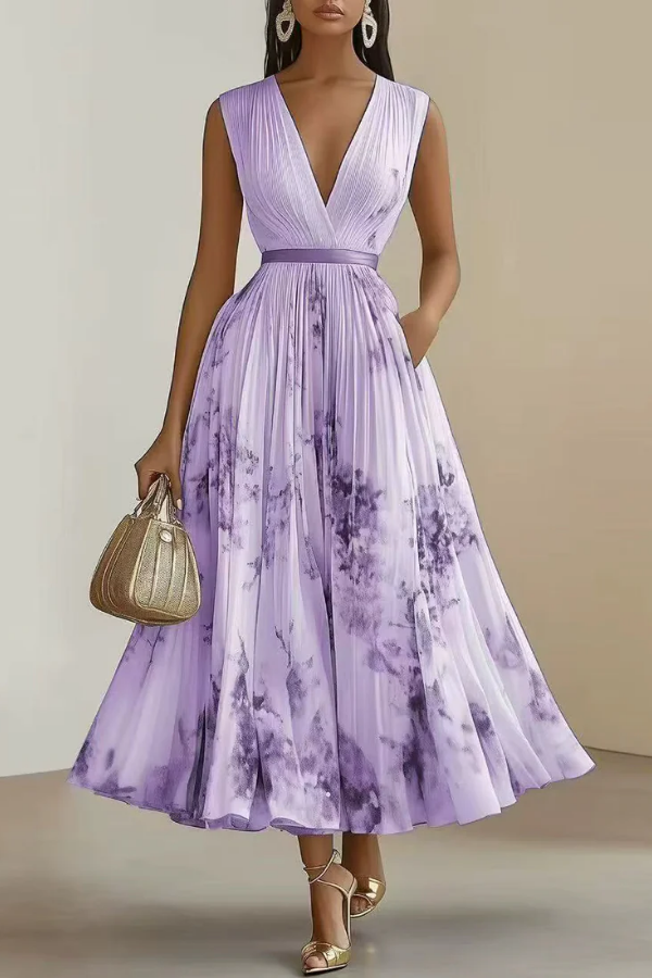 Light & airy women's floral long sleeve pleated maxi dress. Features a stylish V-neck, great for summer parties & elegant events.
