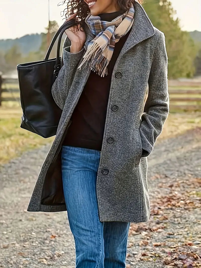 Classic women's button-front trench coat with stylish lapels, ideal outerwear for elegant fall & winter layering.