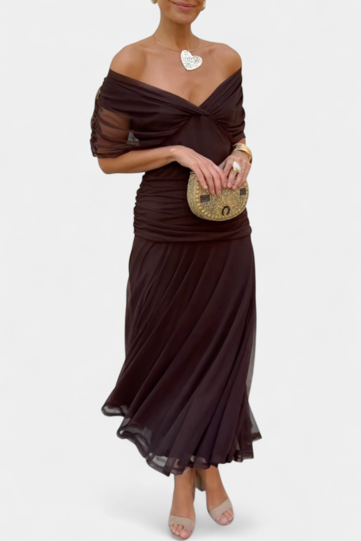 Formal off-shoulder maxi gown for women, with sophisticated draped details, great for wedding guest.