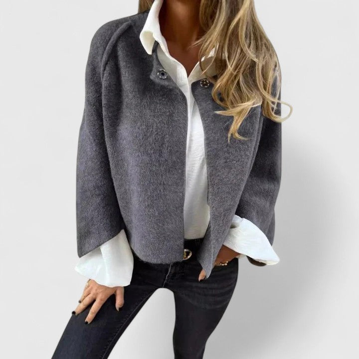Stylish women's open-front jacket, versatile elegant outerwear for a modern look.