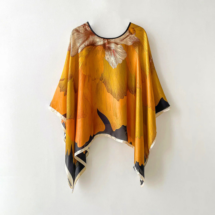 Women's elegant patterned shawl, a versatile and stylish fashion accessory for adding a chic touch to any outfit.