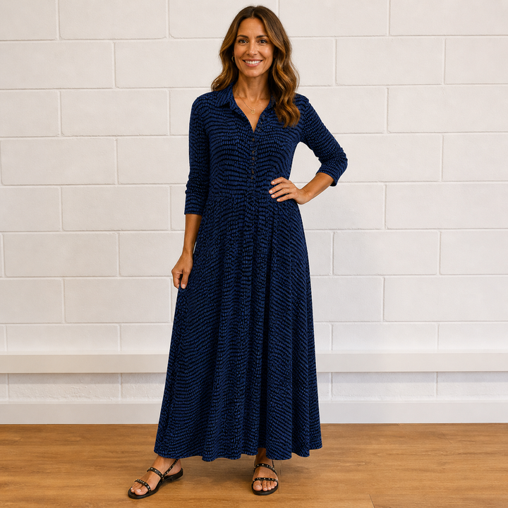 Women's versatile printed maxi dress. Long sleeves & full button-front detail. Elegant for any occasion.