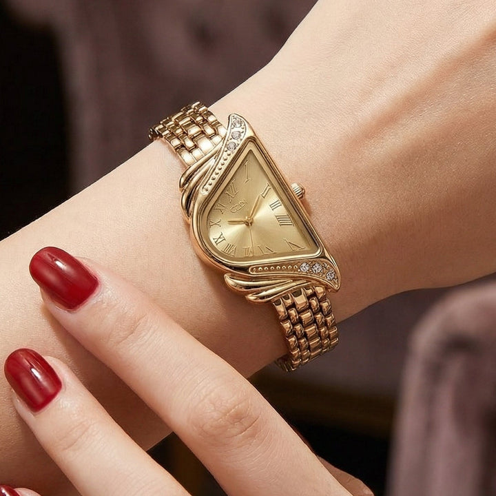 Stylish silver alloy women's watch, irregular rhombus dial, water resistant quartz movement. Designer timepiece.