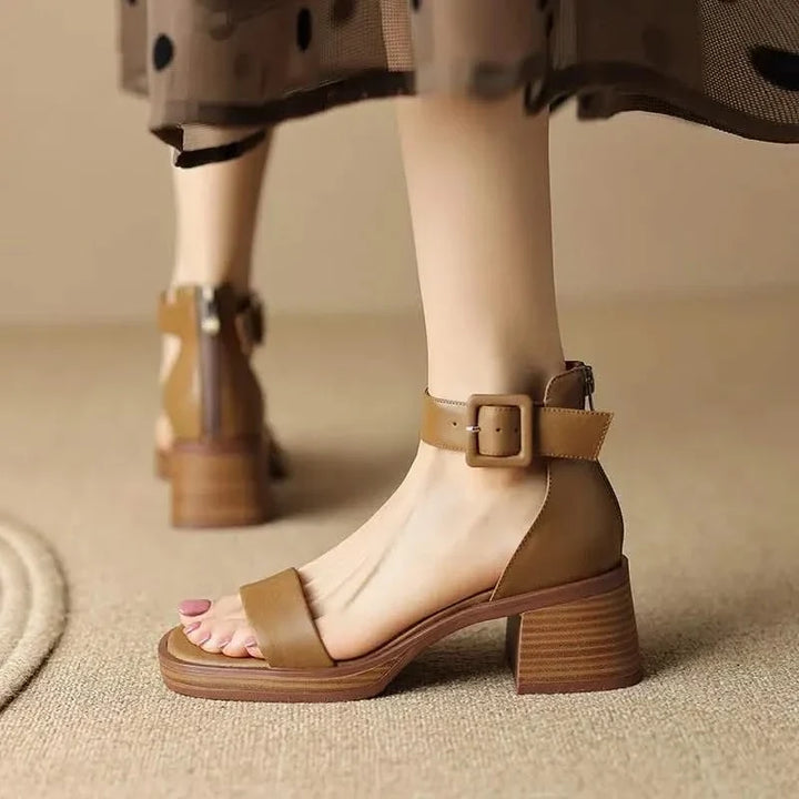 Elegant women's ankle strap block heels, offering both secure fit and comfortable wear.