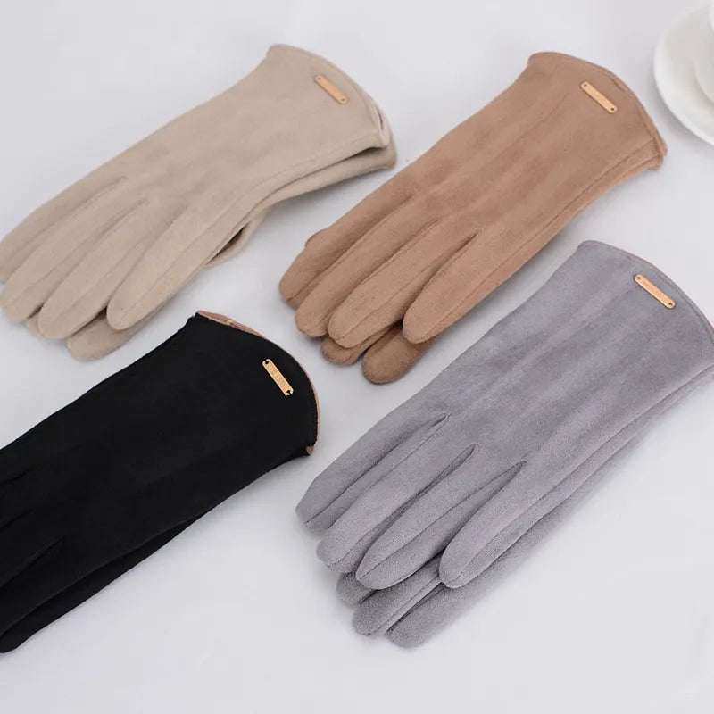 Warm women's suede winter gloves with plush cashmere lining, offering touchscreen accessibility.