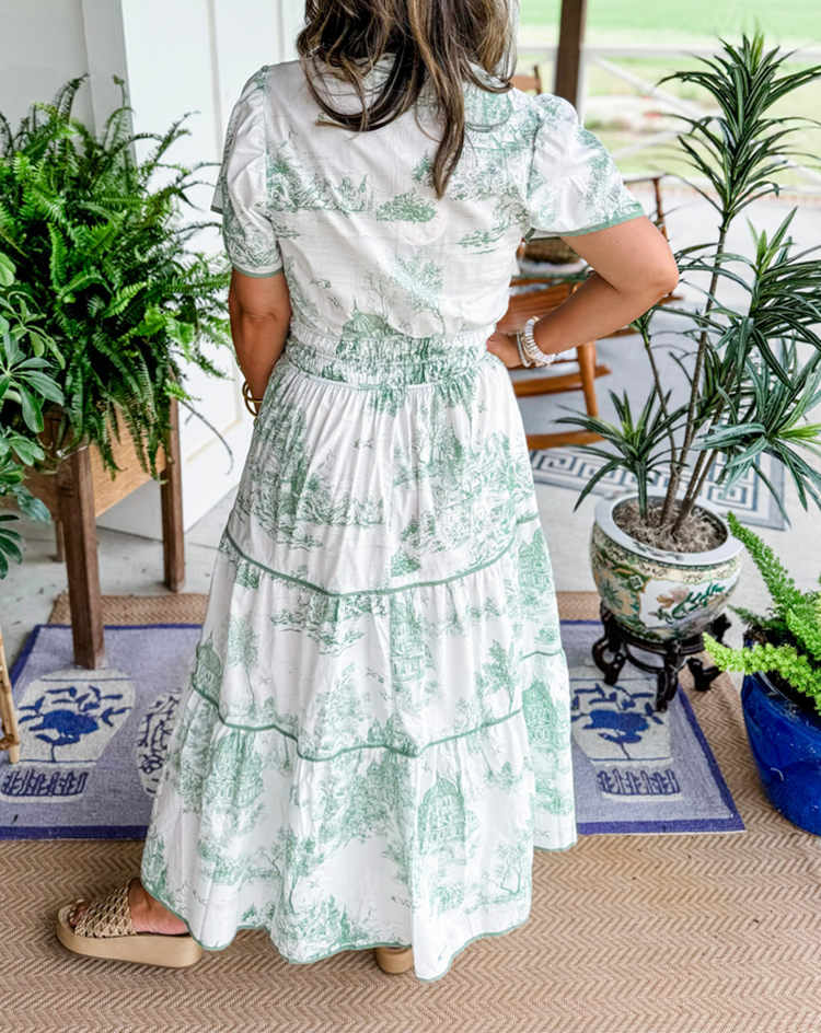 Comfortable women's toile maxi dress, elegant v-neck and smocked waist, perfect for warm weather.
