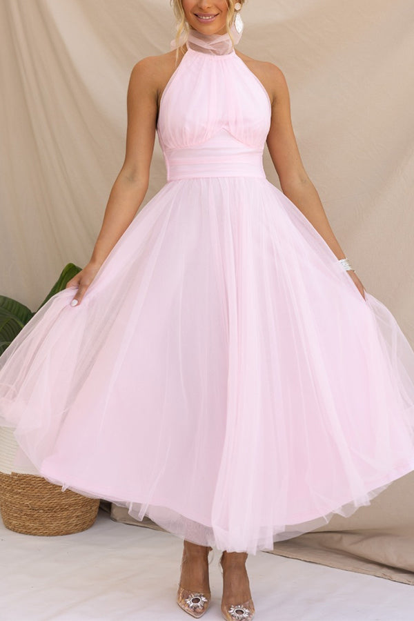 Delicate tulle women's midi dress, an elegant choice for cocktail parties, weddings, or special occasions.