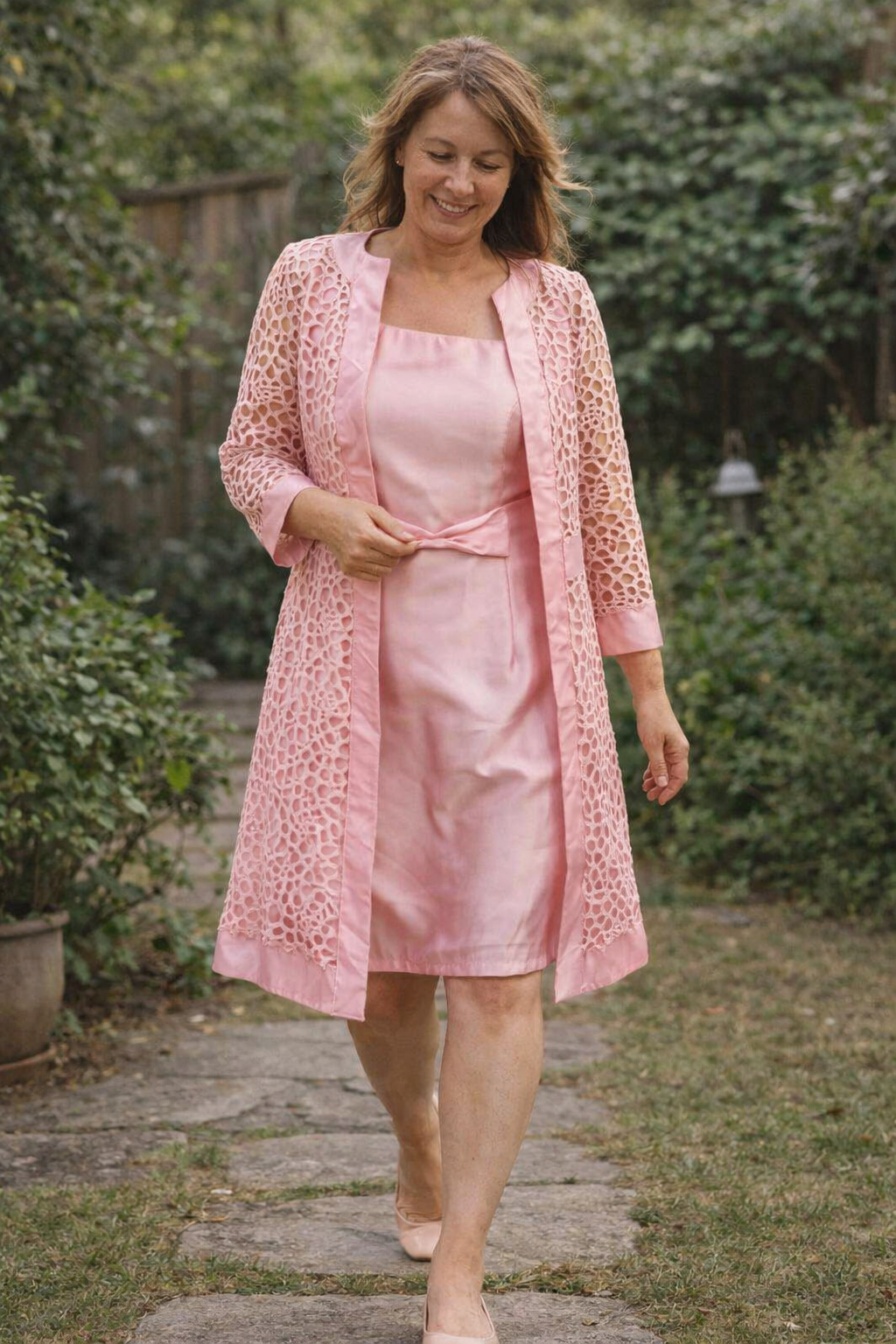Women's elegant two-piece dress and jacket set. Perfect formal wear for special occasions, cocktail or evening events.