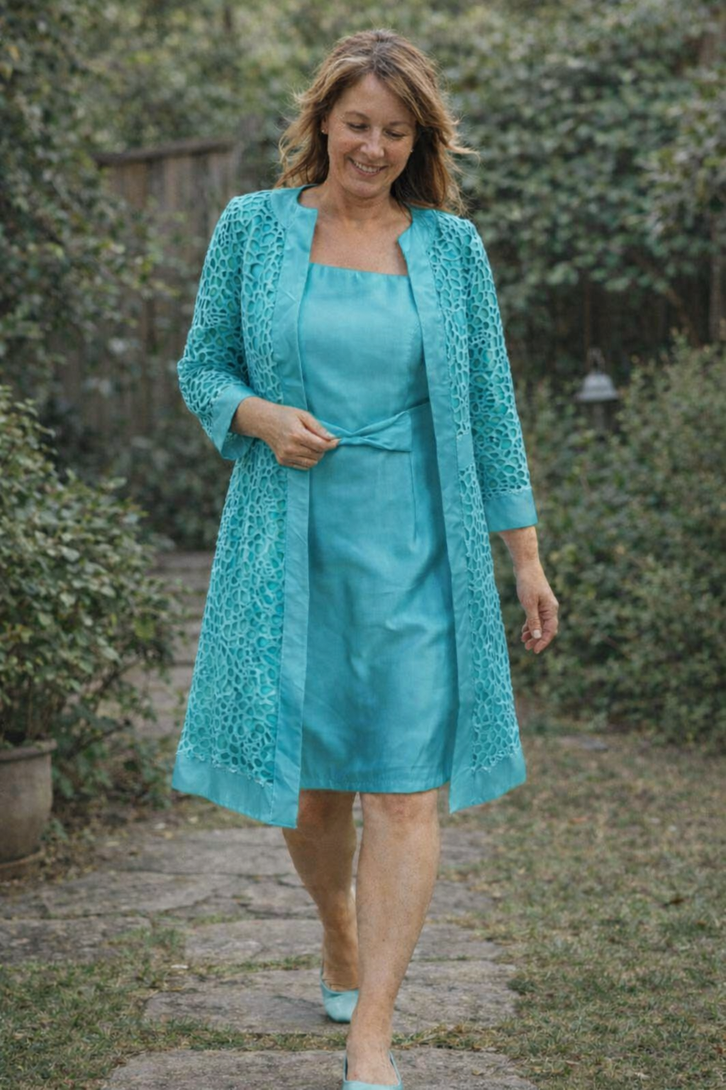 Elegant pink formal dress & jacket set for women. Perfect two-piece special occasion ensemble.