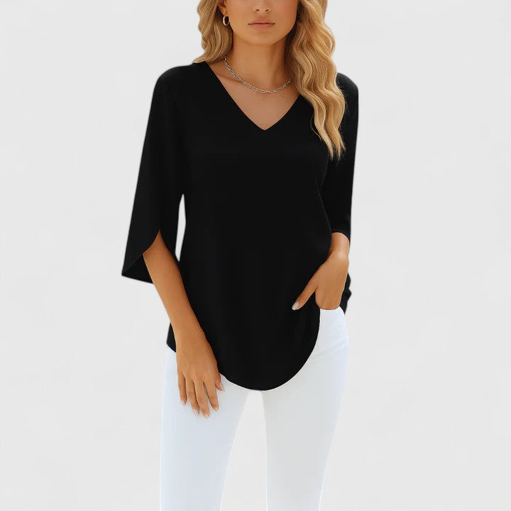 Ladies' sophisticated V-neck top in a relaxed fit. Elegant women's blouse, ideal for summer fashion.