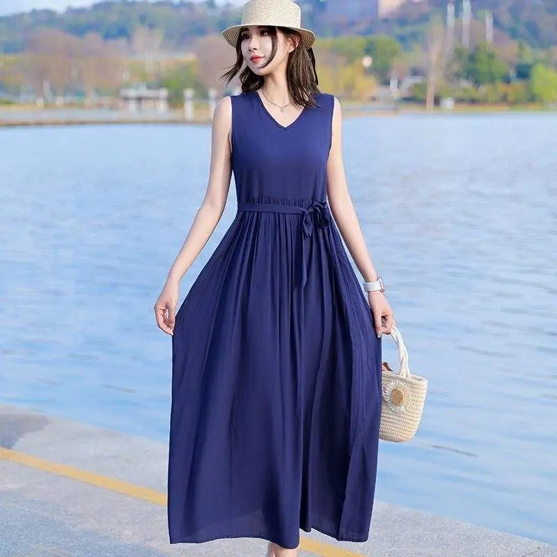 Stylish women's V-neck maxi dress, perfect for summer, with a chic tie waist & functional pockets.