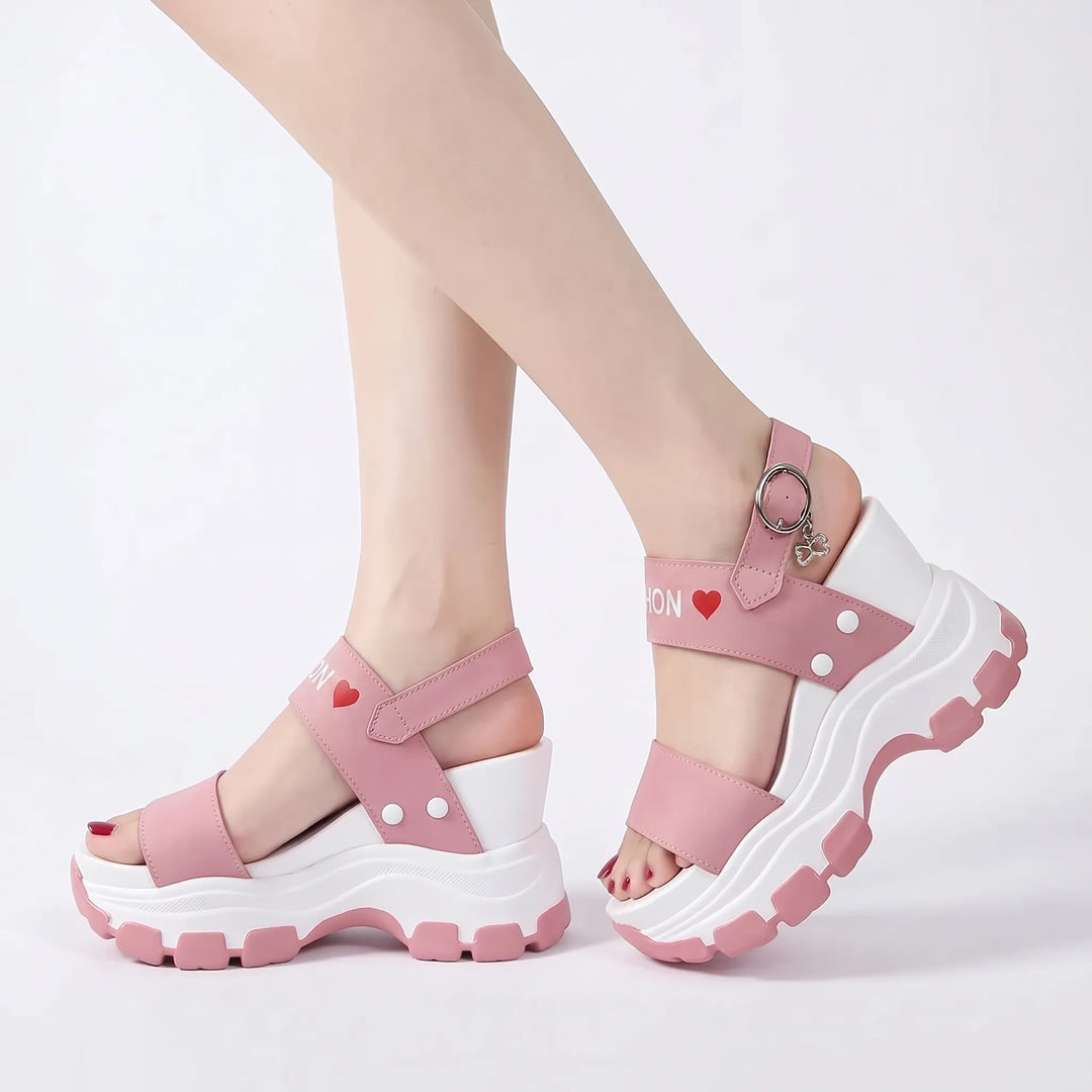 Stylish open-toe women's chunky platform sandals. Fashion-forward footwear with an elevated summer look.