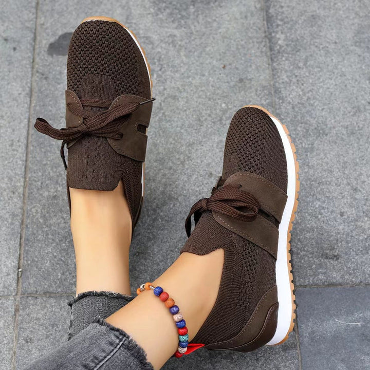 Active women's orthopedic sneakers providing ergonomic support for walking, daily wear & pain relief.