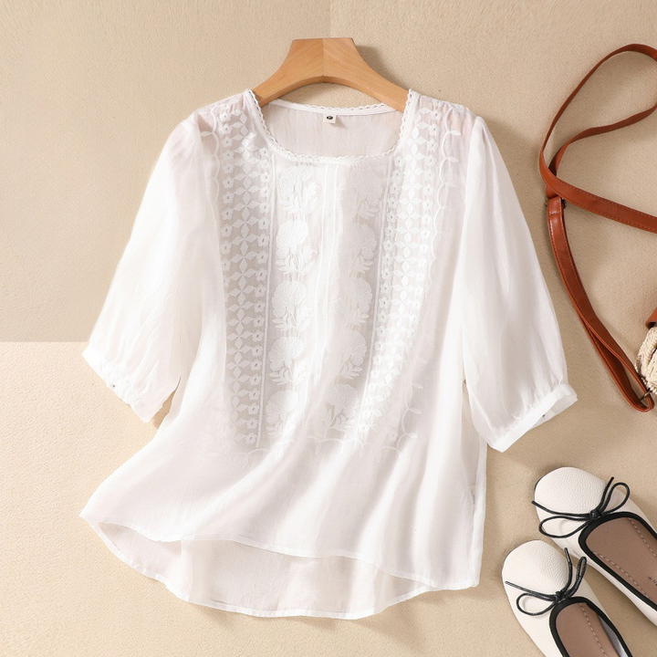 Women's Esmeralda Summer Lace Blouse, elegant floral lace top for warm weather fashion.