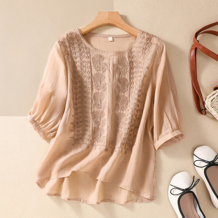 Elegant Esmeralda lace blouse for women, a stylish and relaxed fit top for summer casual wear.