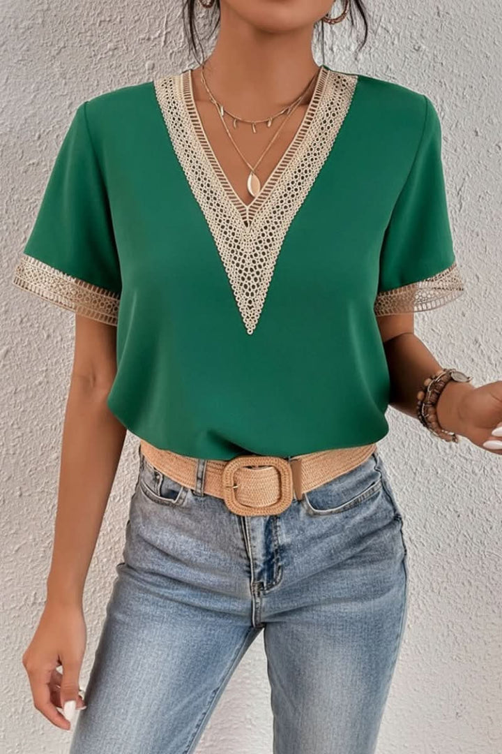 Plain women's short sleeve t-shirt with a rounded crew neck, perfect for layering or solo wear.