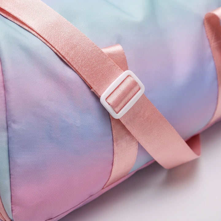 Stylish women's activewear duffel bag; versatile for gym, fitness, or a weekend trip. Includes a practical shoe section.