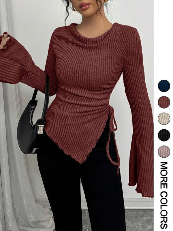 Versatile women's long sleeve rib knit wrap shirt. Features a flattering tie waist & elegant flared sleeves.