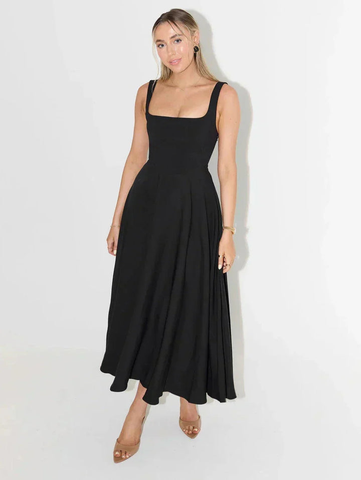 Elegant women's midi dress with a flattering square neck, ideal for a comfortable, chic fashion statement.