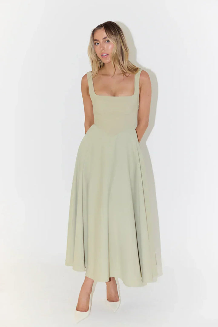 Flattering women's midi dress with a unique square neckline, offering elegant and versatile styling.