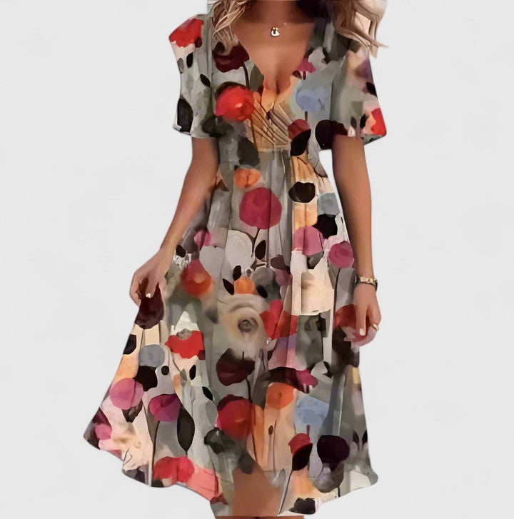 Casual summer V-neck floral midi dress for women, featuring stylish flutter sleeves. Versatile fashion.
