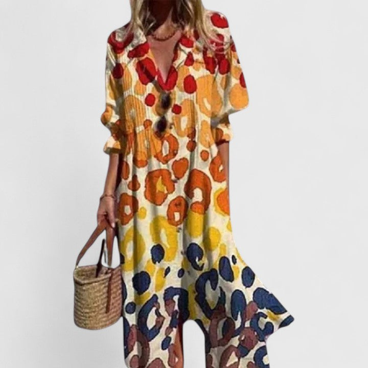 Elegant women's pleated midi shirtdress in a beautiful floral print. Features a stylish collar & button-down design. Fashion.