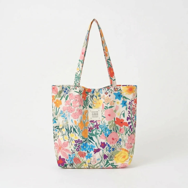 Perfect summer women's floral tote bag, fashionable & spacious shoulder carry for outings.