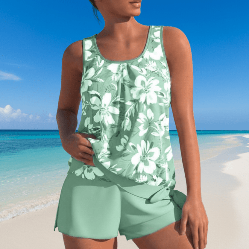 Stylish women's floral two-tone tankini set, aqua blue, gray & green, perfect summer beach & pool fashion.