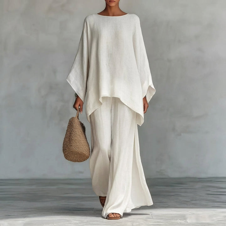 Boho chic women's two-piece flowing set with oversized tunic top and maxi skirt for summer fashion.