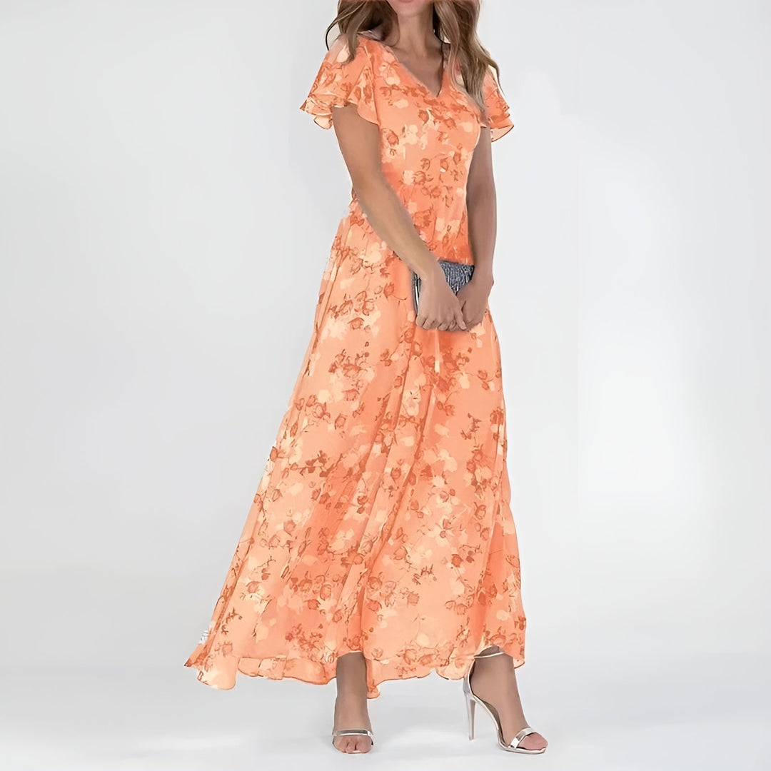 Women's flowing watercolor floral maxi dress, perfect for summer elegance & resort style. Comfortable & chic.