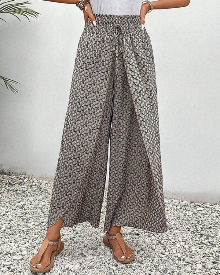 Comfortable & flowy women's wide leg trousers with a relaxed fit, ideal for all-day wear.