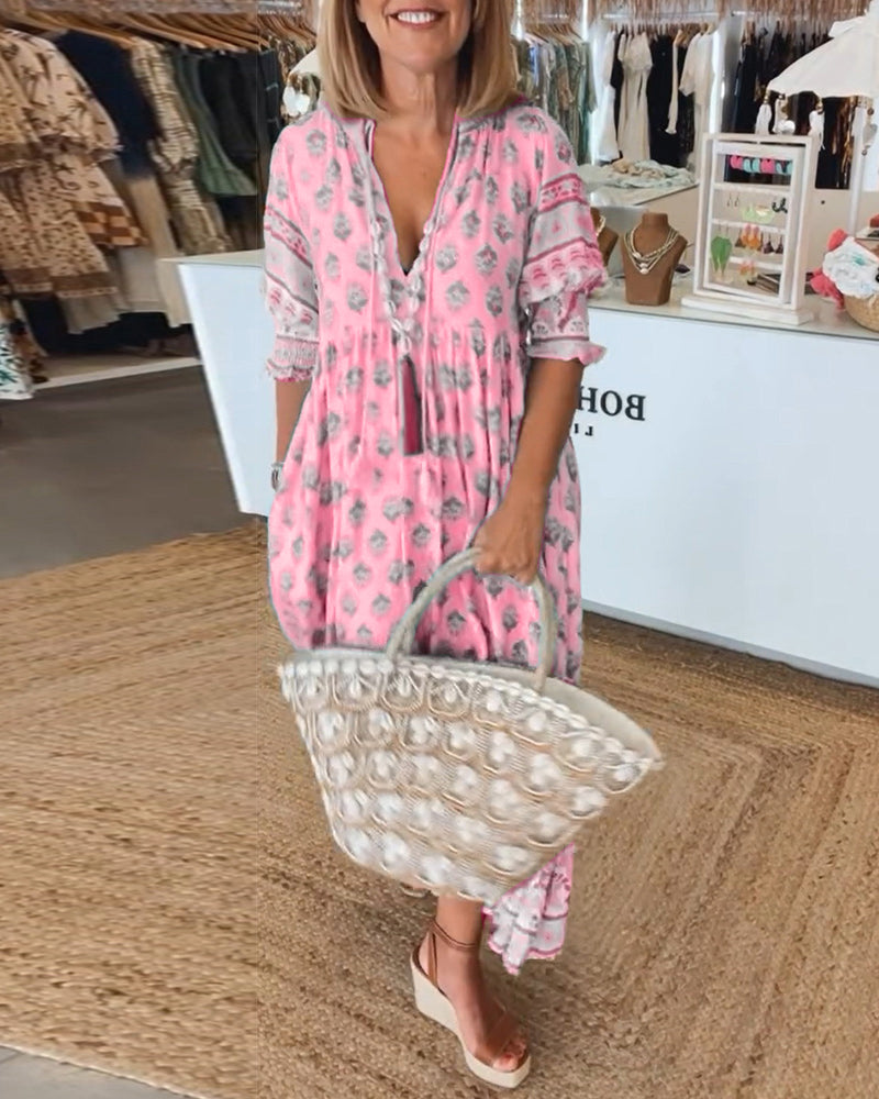 Chic women's bohemian flowy midi dress, perfect for spring casual wear, with stylish lantern sleeves.