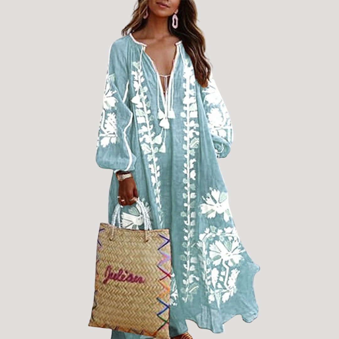 Elegant V-neck long sleeve patterned boho maxi dress for women. Comfortable and flowy, ideal for spring casual outings.