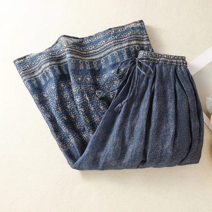 Artistic fashion women's printed flowy midi skirt, ideal for comfortable and elegant summer casual wear.