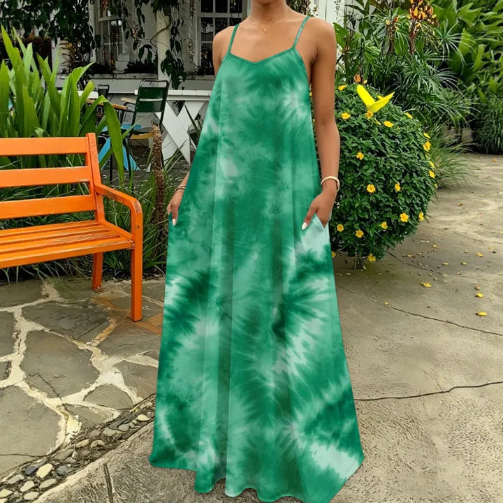 Breezy tie-dye maxi dress for women, with narrow straps & a flattering V-neck, perfect for a relaxed summer day.