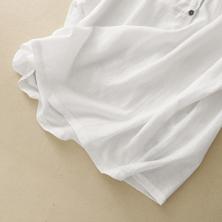Versatile women's flowy V-neck blouse with airy half sleeves, an elegant & comfortable top for casual or office wear.