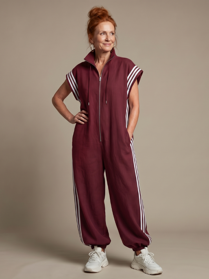 Women's full length sporty jumpsuit with side stripe, high neck & cap sleeves.