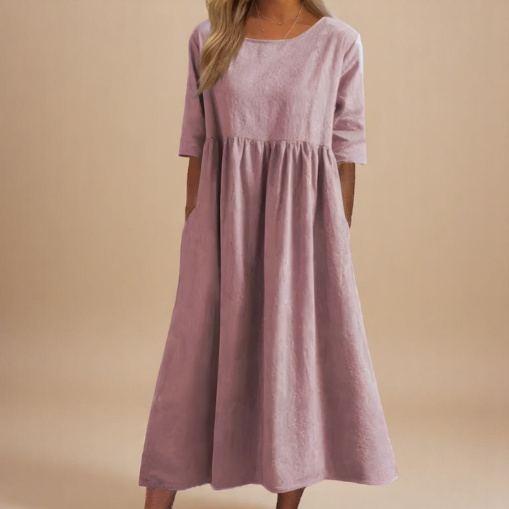 Relaxed fit women's midi dress, half-sleeve, gathered waist, perfect for spring fashion.