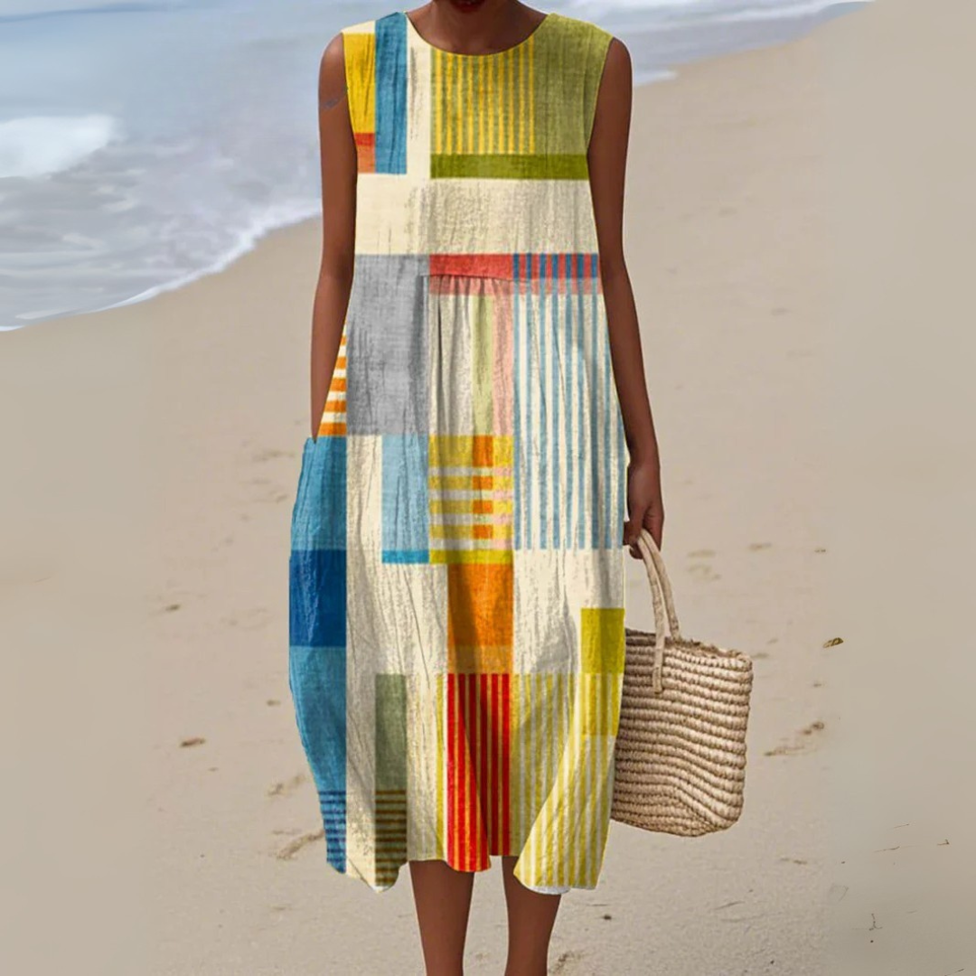 Women's geometric patchwork midi dress, sleeveless with a relaxed fit. Ideal for summer casual & bohemian style.