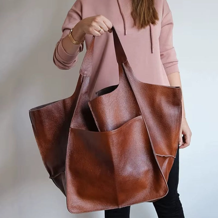 Spacious Women's Grand Carryall Tote, an elegant fashion tote & versatile travel essential.