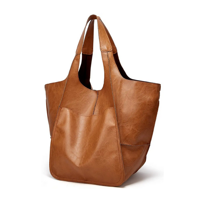 Fashion-forward Women's Grand Carryall Tote, a versatile shoulder bag for everyday elegance.