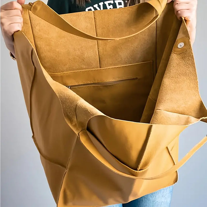 Women's Grand Carryall Handbag, an elegant & spacious tote ideal for travel & everyday style.